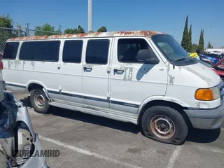 2001 Dodge Passenger z VIN 2B5WB35Z51K561431, wystawiony jako IAAI lot #42003952 z przebiegiem 171 240 mil mil oraz . Historia ofert i sprzedaży dostępna na DreamBid. Obrazek 13.