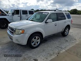 2012 Ford Escape Limited with VIN 1FMCU0EG3CKB49563, listed as a Copart auction lot 74003184 with 115,060 mi miles and Salvage Title. Bid and sale history available at carsss.com. Image 1.