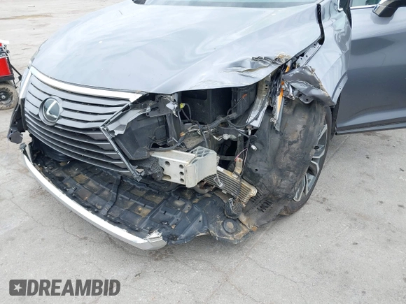 2018 Lexus RX 350 z VIN 2T2BZMCA0JC138411, wystawiony jako IAAI lot #42291737 z przebiegiem 58 725 mil mil oraz . Historia ofert i sprzedaży dostępna na DreamBid. Obrazek 6.