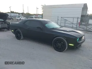 2017 Dodge Challenger SXT z VIN 2C3CDZAG5HH610862, wystawiony jako IAAI lot #42066625 z przebiegiem 120 558 mil mil oraz . Historia ofert i sprzedaży dostępna na DreamBid. Obrazek 1.
