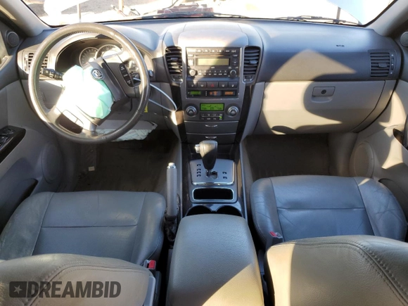 2007 Kia Sorento LX z VIN KNDJD736975696498, wystawiony jako Copart lot #85933984 z przebiegiem 116 434 mil mil oraz Szkoda całkowita • Salvage title. Historia ofert i sprzedaży dostępna na DreamBid. Obrazek 8.