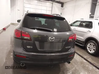 2015 Mazda CX-9 Sport with VIN JM3TB2BA1F0453620, listed as a IAAI auction lot 41330887 with 119,219 mi miles and . Bid and sale history available at carsss.com. Image 16.