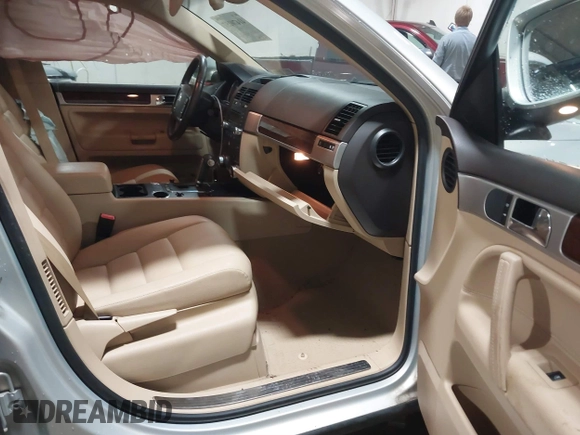 2010 Volkswagen Touareg VR6 with VIN WVGBF7A93AD004398, listed as a IAAI auction lot 41470257 with 108,181 mi miles and . Bid and sale history available at DreamBid. Image 5.