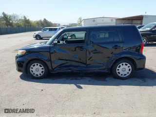 2012 Scion xB with VIN JTLZE4FE5C1147100, listed as a IAAI auction lot 41993922 with 154,620 mi miles. Bid and sale history available at carsss.com. Image 14.