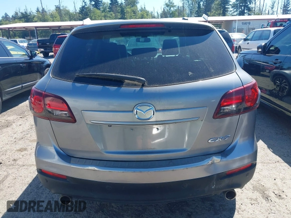2014 Mazda CX-9 Grand Touring with VIN JM3TB2DA9E0435295, listed as a IAAI auction lot 42618683 with 177,783 mi miles and . Bid and sale history available at DreamBid. Image 16.