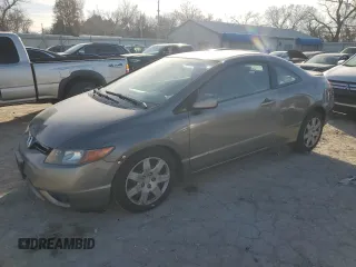 2007 Honda Civic Cpe LX with VIN 2HGFG12657H571830, listed as a Copart auction lot 84762694 with 235,390 mi miles and Salvage Title. Bid and sale history available at carsss.com. Image 1.
