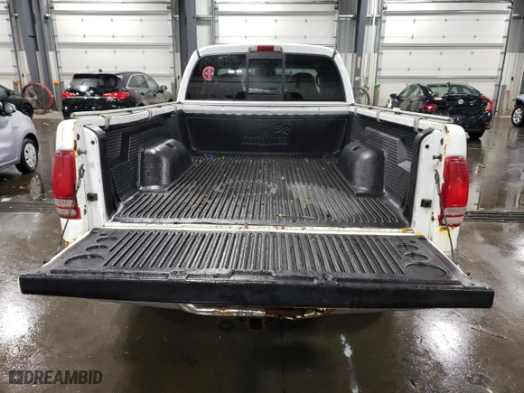 2000 Dodge Dakota Sport with VIN 1B7GG22N3YS534379, listed as a Copart auction lot 75881584 with 154,643 mi miles and Salvage Title. Bid and sale history available at carsss.com. Image 6.