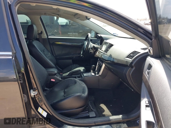 2016 Mitsubishi Lancer GT with VIN JA32U8FW8GU011501, listed as a IAAI auction lot 41779016 with 153,082 mi miles. Bid and sale history available at carsss.com. Image 5.