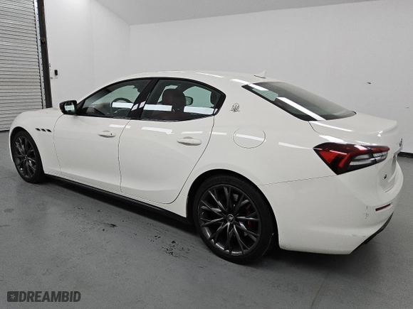 2021 Maserati Ghibli S with VIN ZAM57YSA6M1360181, listed as a Copart auction lot 43330245 with 61,595 mi miles and Clean Title. Bid and sale history available at carsss.com. Image 2.
