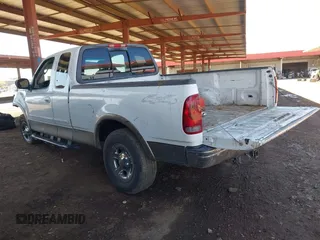 2003 Ford F-150 XL with VIN 1FTRX18L03NA45728, listed as a IAAI auction lot 41860421 with 179,596 mi miles. Bid and sale history available at carsss.com. Image 3.