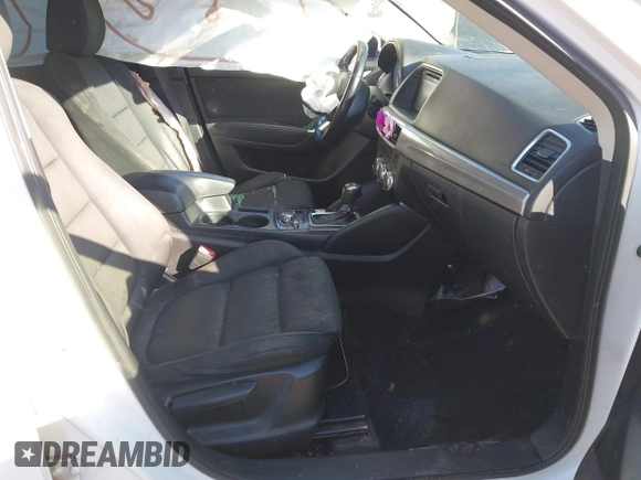 2016 Mazda CX-5 Touring z VIN JM3KE2CY9G0807688, wystawiony jako IAAI lot #41039438 z przebiegiem 169 483 mil mil oraz . Historia ofert i sprzedaży dostępna na DreamBid. Obrazek 5.