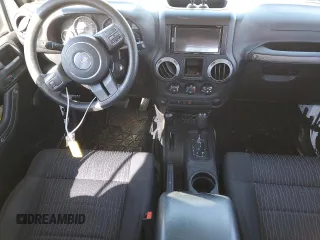 2012 Jeep Wrangler Unlimited Sport with VIN 1C4BJWDG2CL257437, listed as a Copart auction lot 49257965 with 141,695 mi miles and Clean title. Bid and sale history available at DreamBid. Image 8.