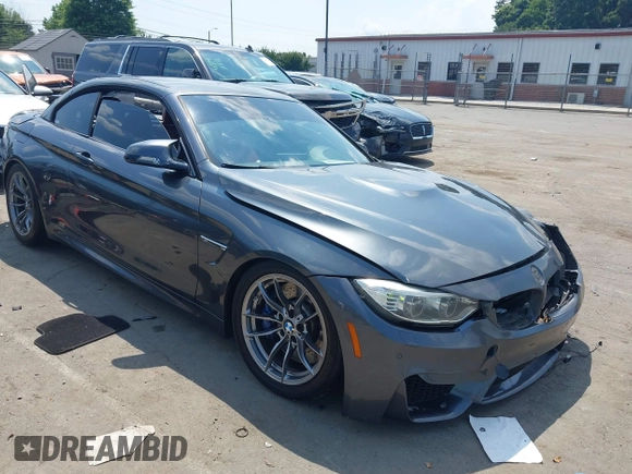 2015 BMW M4 with VIN WBS3U9C5XFJ967725, listed as a IAAI auction lot 42593444 with Not provided miles and . Bid and sale history available at DreamBid. Image 1.