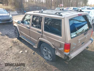 1999 Jeep Cherokee Sport with VIN 1J4FF68S2XL554452, listed as a IAAI auction lot 41930116 with 194,230 mi miles and . Bid and sale history available at DreamBid. Image 3.