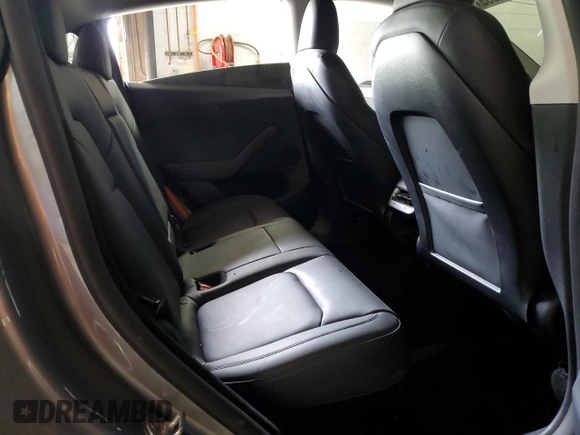 2024 Tesla Model Y Long Range with VIN 7SAYGDEE2RA299824, listed as a Copart auction lot 56040835 with 16,534 mi miles and Salvage title. Bid and sale history available at DreamBid. Image 11.