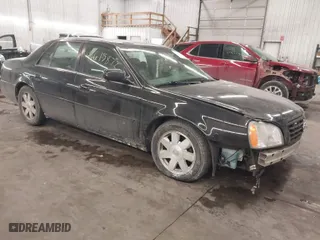 2003 Cadillac DeVille DTS with VIN 1G6KF57953U134219, listed as a IAAI auction lot 41615872 with 147,901 mi miles. Bid and sale history available at carsss.com. Image 1.
