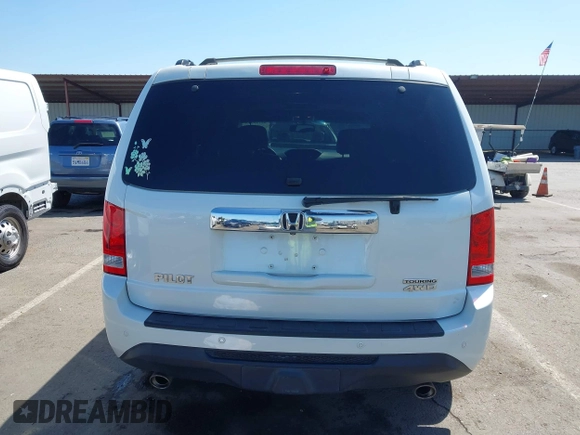 2013 Honda Pilot Touring with VIN 5FNYF4H92DB031589, listed as a IAAI auction lot 42159313 with 192,604 mi miles and . Bid and sale history available at carsss.com. Image 16.