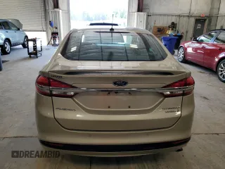 2017 Ford Fusion Hybrid Titanium with VIN 3FA6P0RU3HR360053, listed as a Copart auction lot 63063715 with 127,534 mi miles and Non repairable. Bid and sale history available at DreamBid. Image 6.