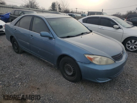 2003 Toyota Camry LE with VIN 4T1BE32K53U687513, listed as a Copart auction lot 88604195 with 242,312 mi miles and Clean Title. Bid and sale history available at DreamBid. Image 4.