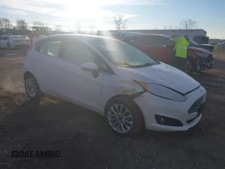 2017 Ford Fiesta Titanium with VIN 3FADP4FJ8HM112435, listed as a IAAI auction lot 41005143 with 75,144 mi miles and . Bid and sale history available at DreamBid. Image 1.