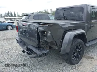 2021 Jeep Gladiator High Altitude with VIN 1C6HJTFG8ML567087, listed as a IAAI auction lot 42549990 with 30,437 mi miles and . Bid and sale history available at DreamBid. Image 6.