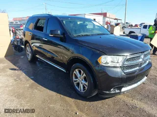 2013 Dodge Durango Crew with VIN 1C4SDHDT3DC553939, listed as a IAAI auction lot 41404491 with 148,505 mi miles. Bid and sale history available at carsss.com. Image 1.