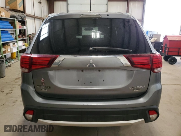 2016 Mitsubishi Outlander ES z VIN JA4AZ2A34GZ604519, wystawiony jako Copart lot #54229255 z przebiegiem 153 703 mil mil oraz Szkoda całkowita • Salvage title. Historia ofert i sprzedaży dostępna na DreamBid. Obrazek 6.