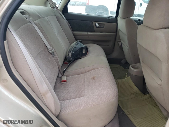 2001 Ford Taurus LX with VIN 1FAFP52U51A145880, listed as a Copart auction lot 77084934 with 54,143 mi miles and Salvage Title. Bid and sale history available at carsss.com. Image 10.
