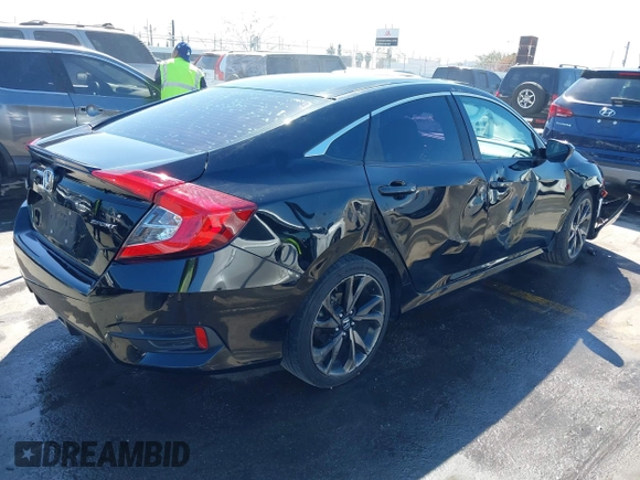 2021 Honda Civic Sport with VIN 2HGFC2F81MH529499, listed as a IAAI auction lot 41836215 with 55,833 mi miles and . Bid and sale history available at DreamBid. Image 4.