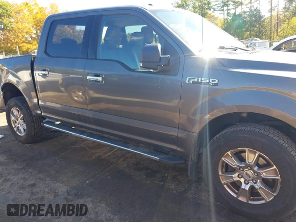 2015 Ford F-150 XLT with VIN 1FTEW1EF7FFB65198, listed as a IAAI auction lot 40509417 with 119,649 mi miles and . Bid and sale history available at DreamBid. Image 14.