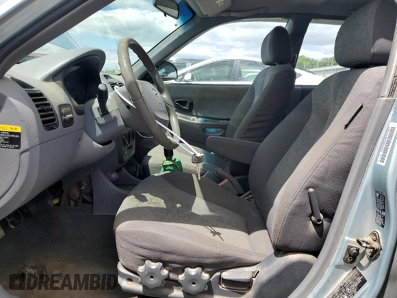 2004 Hyundai Accent GL z VIN KMHCG45C94U574027, wystawiony jako Copart lot #57463905 z przebiegiem 139 595 mil mil oraz Szkoda całkowita • Salvage title. Historia ofert i sprzedaży dostępna na DreamBid. Obrazek 7.