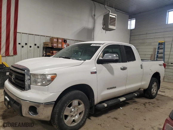 2012 Toyota Tundra 4WD Truck with VIN 5TFUW5F1XCX244862, listed as a Copart auction lot 82760194 with 234,657 mi miles and Salvage Title. Bid and sale history available at carsss.com. Image 1.