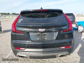 2020 Cadillac XT4 FWD Premium Luxury with VIN 1GYFZCR44LF070832, listed as a IAAI auction lot 41249608 with 77,471 mi miles. Bid and sale history available at carsss.com. Image 16.