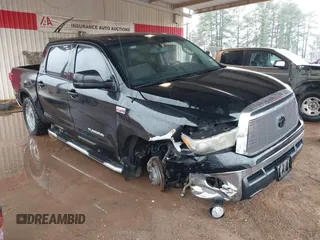 2012 Toyota Tundra 4WD Truck with VIN 5TFDW5F1XCX253223, listed as a IAAI auction lot 41453842 with 163,730 mi miles. Bid and sale history available at carsss.com. Image 1.