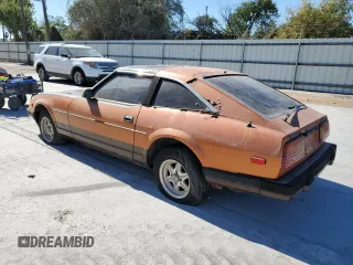 1982 Datsun 280ZX 2+2 z VIN JN1HZ06S8CX428785, wystawiony jako Copart lot #80942274 z przebiegiem 88 574 mil mil oraz Tytuł czysty. Historia ofert i sprzedaży dostępna na DreamBid. Obrazek 2.