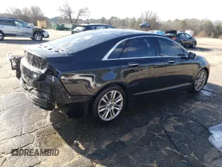 2014 Lincoln MKZ z VIN 3LN6L2GK3ER802789, wystawiony jako Copart lot #86357034 z przebiegiem 215 548 mil mil oraz Szkoda całkowita • Salvage title. Historia ofert i sprzedaży dostępna na DreamBid. Obrazek 3.