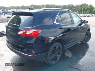 2021 Chevrolet Equinox LT with VIN 2GNAXUEV7M6117879, listed as a IAAI auction lot 42687171 with 53,134 mi miles and . Bid and sale history available at DreamBid. Image 4.