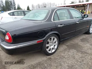 2004 Jaguar XJ with VIN SAJWA71C94SG29019, listed as a IAAI auction lot 41664978 with 133,546 mi miles. Bid and sale history available at carsss.com. Image 4.