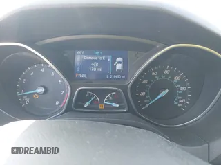 2014 Ford Focus SE with VIN 1FADP3F29EL122925, listed as a IAAI auction lot 42044004 with 216,490 mi miles. Bid and sale history available at carsss.com. Image 7.