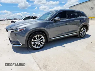 2018 Mazda CX-9 Signature с VIN JM3TCBEY2J0210915, выставлен на аукционе Copart как лот 62232165 с пробегом 79 197 миль миль и Чистый • Clean title. История ставок и продаж доступна на DreamBid. Изображение 1.