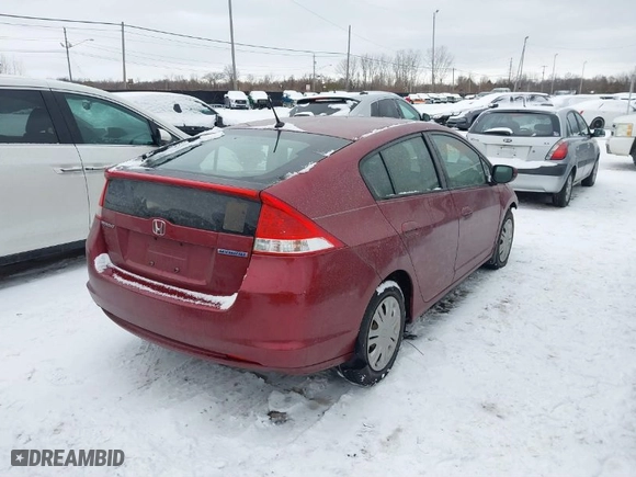 2010 Honda Insight LX with VIN JHMZE2H51AS004907, listed as a IAAI auction lot 41259182 with 76,494 mi miles. Bid and sale history available at carsss.com. Image 4.