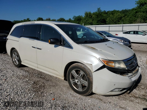 2013 Honda Odyssey Touring with VIN 5FNRL5H90DB003003, listed as a Copart auction lot 58519345 with 259,383 mi miles and Salvage title. Bid and sale history available at DreamBid. Image 4.