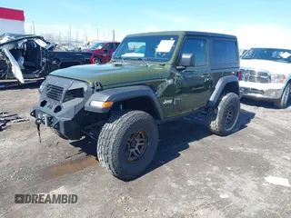 2021 Jeep Wrangler 80th Anniversary with VIN 1C4HJXAG4MW647038, listed as a IAAI auction lot 41580575 with 19,051 mi miles and . Bid and sale history available at DreamBid. Image 17.