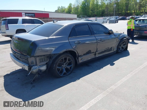 2022 Chrysler 300 S with VIN 2C3CCABG1NH259933, listed as a IAAI auction lot 42056429 with 51,327 mi miles and . Bid and sale history available at DreamBid. Image 4.