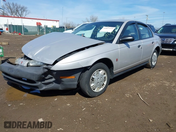 1999 Saturn SL z VIN 1G8ZH5281XZ376254, wystawiony jako IAAI lot #41857372 z przebiegiem 229 836 mil mil oraz . Historia ofert i sprzedaży dostępna na DreamBid. Obrazek 17.