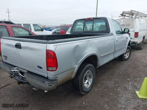 1998 Ford F-150 Standard with VIN 1FTZF18W2WNC27724, listed as a IAAI auction lot 41501654 with 336,342 mi miles. Bid and sale history available at carsss.com. Image 4.