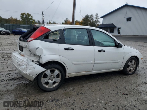 2004 Ford Focus with VIN 3FAFP37Z94R101447, listed as a Copart auction lot 74570054 with 162,166 mi miles and Salvage title. Bid and sale history available at DreamBid. Image 3.