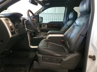 2014 Ford F-150 XL with VIN 1FTFW1ETXEFB39719, listed as a Copart auction lot 62073335 with 124,643 mi miles and Salvage title. Bid and sale history available at DreamBid. Image 7.