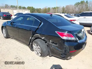 2012 Acura TL Auto z VIN 19UUA8F22CA002919, wystawiony jako IAAI lot #41782626 z przebiegiem 156 394 mil mil oraz . Historia ofert i sprzedaży dostępna na DreamBid. Obrazek 3.