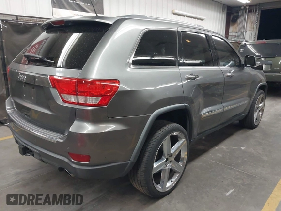 2013 Jeep Grand Cherokee Limited with VIN 1C4RJEBT9DC547491, listed as a IAAI auction lot 41969275 with 161,600 mi miles. Bid and sale history available at carsss.com. Image 4.